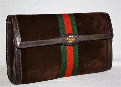 vintage gucci accessories|Gucci vintage suede clutch.